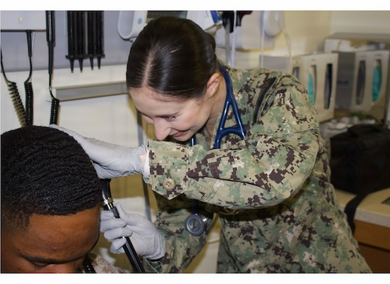 Hospitalman Chloe Gerimonte (right) provides care to a patient at the Adult Medical Care Clinic at Navy Medicine Readiness and Training Command Twentynine Palms aboard Marine Corps Air Ground Combat Center Twentynine Palms, California, April 1, 2026. Gerimonte serves as a Hospital Corpsman at the clinic, supporting patient care and medical readiness for Sailors and Marines. (U.S. Navy photo by Hospital Apprentice Evelyn Zermeno, NH/NMRTC Twentynine Palms public affairs).