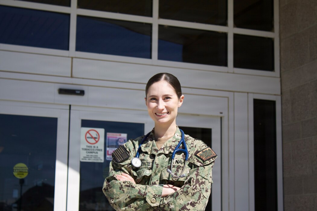 Hospitalman Chloe Gerimonte poses for a portrait outside the Adult Medical Care Clinic at Navy Medicine Readiness and Training Command Twentynine Palms aboard Marine Corps Air Ground Combat Center Twentynine Palms, California, April 1, 2026. Gerimonte previously worked at the clinic as a civilian contractor before answering the call to serve and joining the Navy Hospital Corps. (U.S. Navy photo by Hospital Apprentice Evelyn Zermeno, NH/NMRTC Twentynine Palms public affairs).