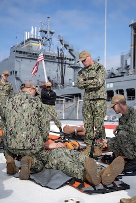 U.S. Navy Sailors assigned to Navy Medicine Readiness Training Command San Diego participate in a shipboard litter bearer training aboard the Freedom-class littoral combat ship USS Fort Worth (LCS-3), June 16. The evolution was part of Mercy Exercise (MERCEX) 26-3, a quarterly exercise strengthening critical integration and readiness between reduced operating status (ROS) and full operating status (FOS) USNS Mercy Sailors, supporting Navy Medicine’s line of effort to deliver and sustain ready naval medical forces. NMRTC San Diego supports Navy and Marine Corps readiness by ensuring its medical forces are ready to deploy and provide medical support, ashore or at sea. (U.S. Navy photo by Mass Communication Specialist 3rd Class Jason Afable)