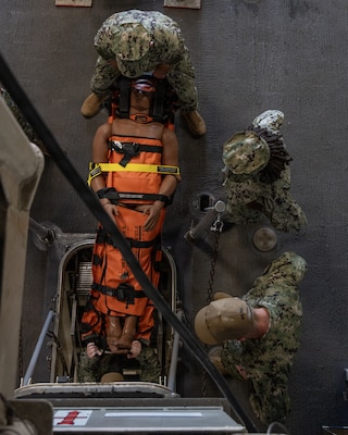 U.S. Navy Sailors assigned to Navy Medicine Readiness Training Command San Diego participate in a shipboard litter bearer training aboard the Freedom-class littoral combat ship USS Fort Worth (LCS-3), June 16. The evolution was part of Mercy Exercise (MERCEX) 26-3, a quarterly exercise strengthening critical integration and readiness between reduced operating status (ROS) and full operating status (FOS) USNS Mercy Sailors, supporting Navy Medicine’s line of effort to deliver and sustain ready naval medical forces. NMRTC San Diego supports Navy and Marine Corps readiness by ensuring its medical forces are ready to deploy and provide medical support, ashore or at sea. (U.S. Navy photo by Mass Communication Specialist 3rd Class Jason Afable)