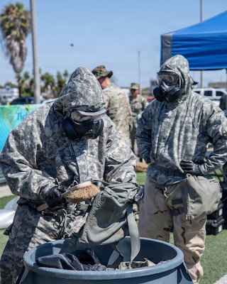 U.S. Navy Sailors assigned to Navy Medicine Readiness Training Command San Diego and U.S. Marines assigned to 1st Marine Logistics Group and 11th Marine Regiment participate in a Chemical, Biological, Radiological, Nuclear, and high-yield Explosive training exercise at Naval Base San Diego, June 16. The evolution was part of Mercy Exercise (MERCEX) 26-3, a quarterly exercise strengthening critical integration and readiness between reduced operating status (ROS) and full operating status (FOS) USNS Mercy Sailors, supporting Navy Medicine’s line of effort to deliver and sustain ready naval medical forces. NMRTC San Diego supports Navy and Marine Corps readiness by ensuring its medical forces are ready to deploy and provide medical support, ashore or at sea. (U.S. Navy photo by Mass Communication Specialist 3rd Class Jason Afable)