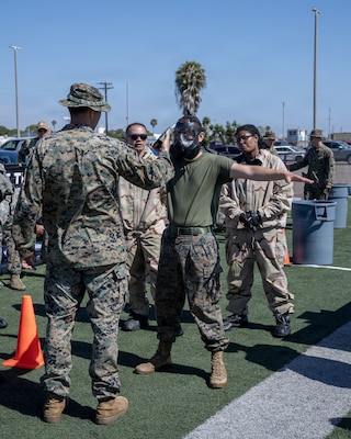 U.S. Navy Sailors assigned to Navy Medicine Readiness Training Command San Diego and U.S. Marines assigned to 1st Marine Logistics Group and 11th Marine Regiment participate in a Chemical, Biological, Radiological, Nuclear, and high-yield Explosive training exercise at Naval Base San Diego, June 16. The evolution was part of Mercy Exercise (MERCEX) 26-3, a quarterly exercise strengthening critical integration and readiness between reduced operating status (ROS) and full operating status (FOS) USNS Mercy Sailors, supporting Navy Medicine’s line of effort to deliver and sustain ready naval medical forces. NMRTC San Diego supports Navy and Marine Corps readiness by ensuring its medical forces are ready to deploy and provide medical support, ashore or at sea. (U.S. Navy photo by Mass Communication Specialist 3rd Class Jason Afable)