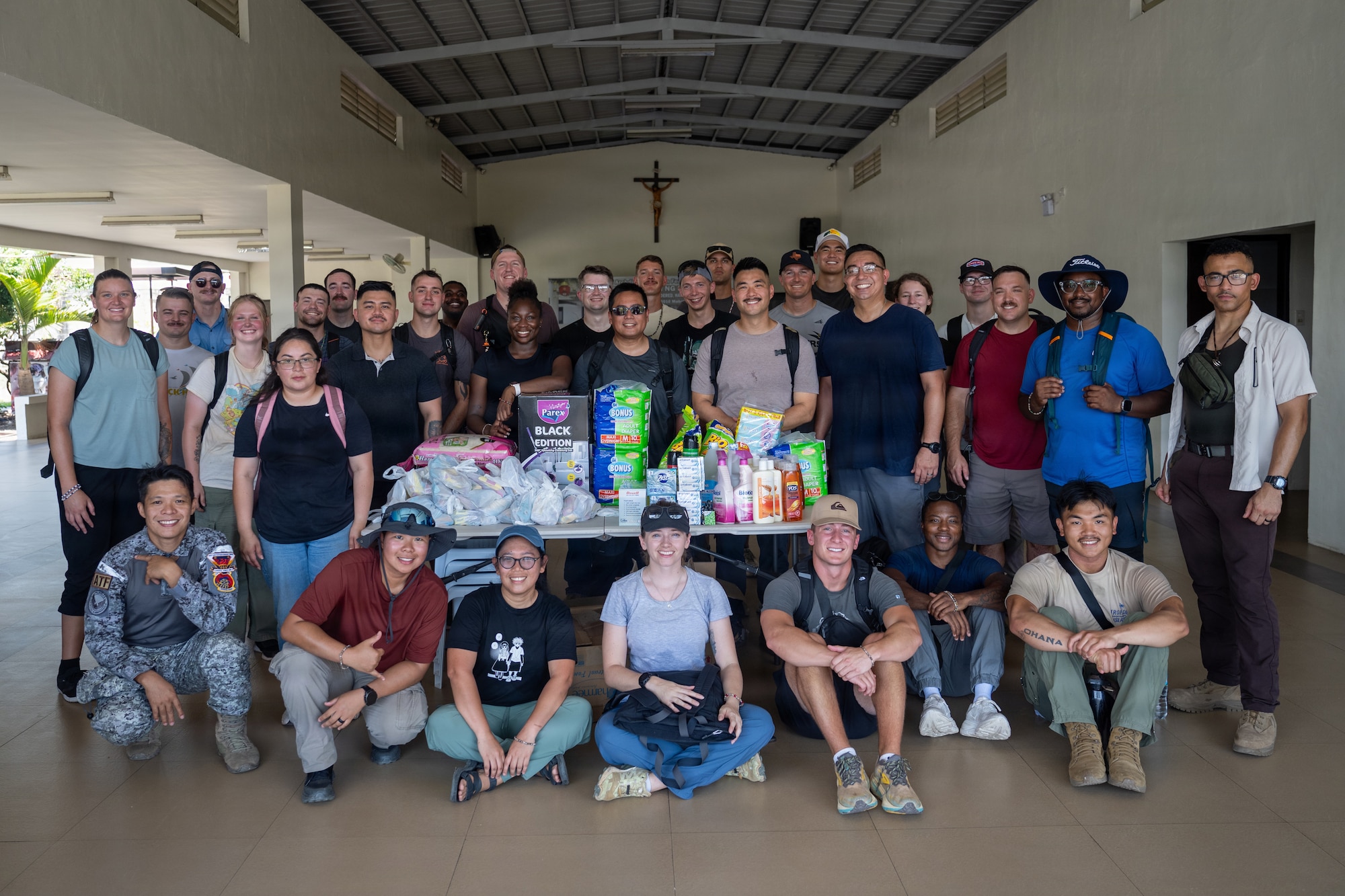 U.S. Airmen assigned to the 21st Air Expeditionary Wing and Philippines Air Force airmen assigned to the 600th Air Base Group pose for a group photo during a community outreach event in Mabalacat, Philippines, May 20, 2026. The outreach event demonstrated the 21st AEW’s role as a unit of action, integrating Airmen across specialties to strengthen partnerships and advance mission objectives throughout the Indo-Pacific. (U.S. Air Force photo by Senior Airman Adrien Tran)