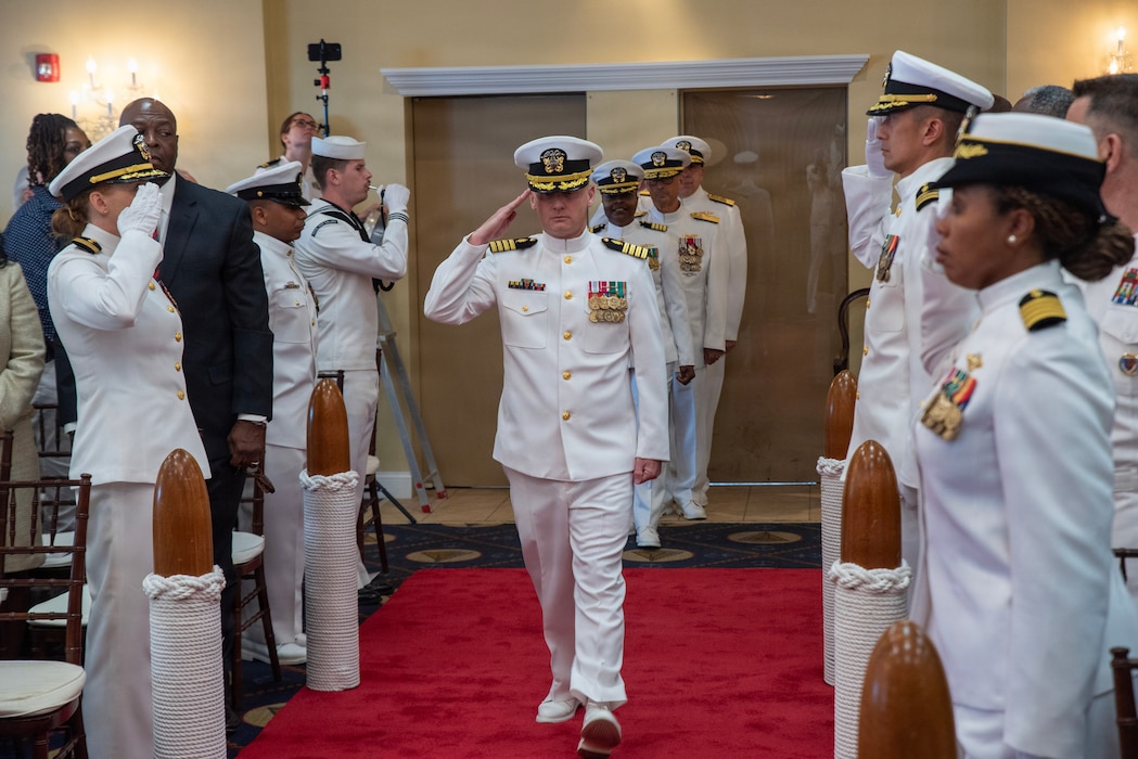 Capt. Kevin Lyle, U.S. Navy Medical Service Corps, is rung aboard as the oncoming commander and director of Navy Medicine Readiness and Training Command New England during the Change of Command ceremony aboard Naval Station Newport, R.I., on June 10, 2026. (U.S. Navy photo by Mass Communication Specialist 1st Class Jacob Allison)
