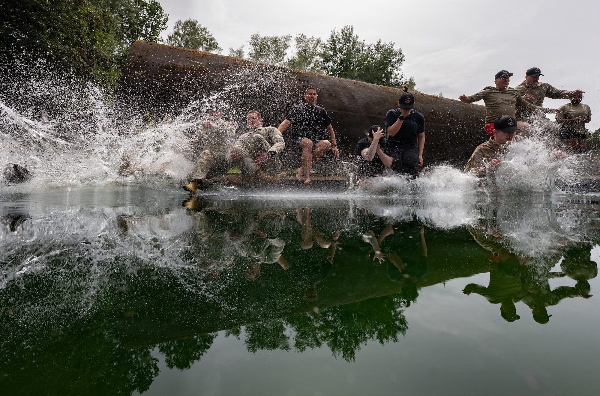 people jump in pool