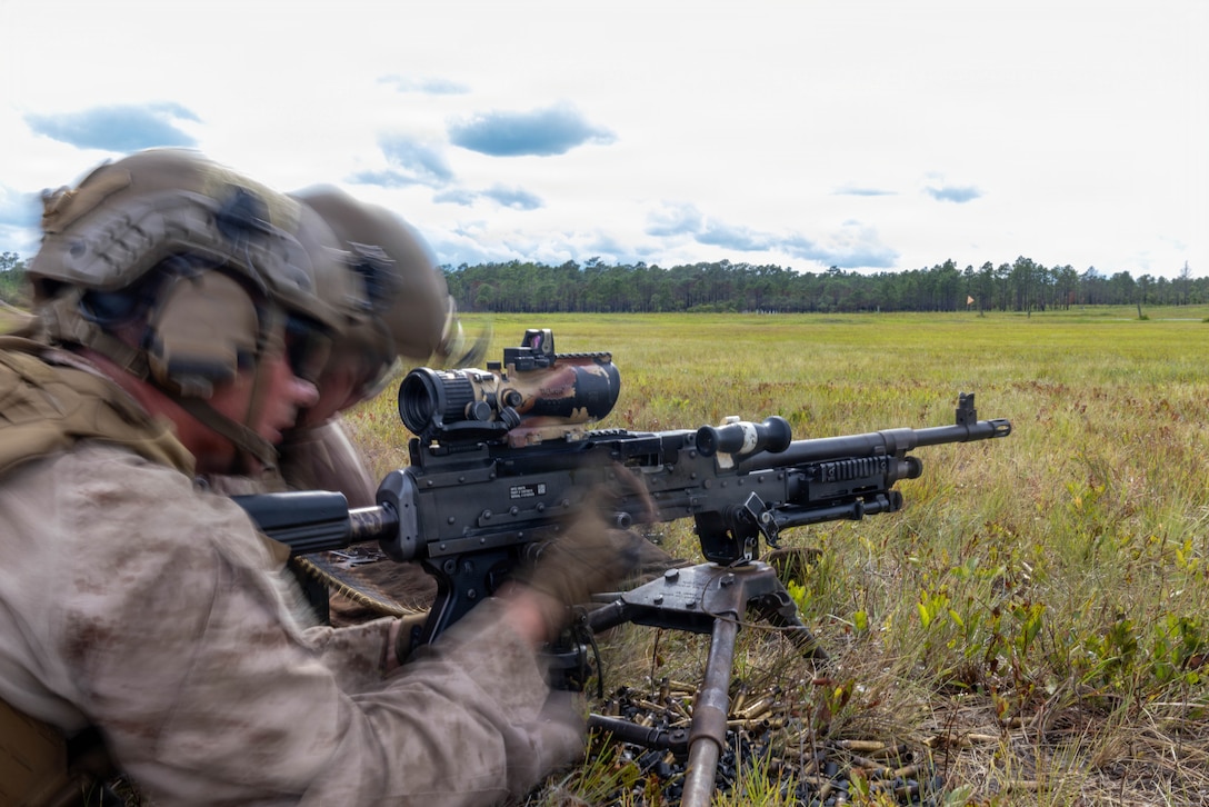 U.S. Marine Corps Pfc. Ethan Emigh, an infantry machine gunner with 1st Battalion, 2nd Marine Regiment, 2nd Marine Division, pulls the charging handle of an M240B medium machine gun during a company live-fire range as part of Fleet Exercise 250 (FLEETEX) on Marine Corps Base Camp Lejeune, North Carolina, June 19, 2026. FLEETEX 250 represents the United States’ commitment to layer defense of the homeland through forward-deployed forces and reinforces interoperability with allies and partners through collective maritime security. (U.S. Marine Corps photo by Cpl. Channah Chilton)