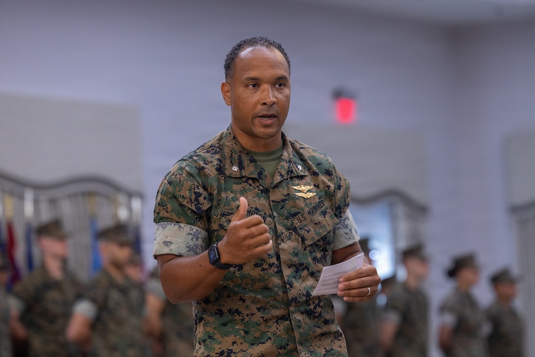 U.S. Marine Corps Lt. Col. Brian Hampton, from Illinois, the incoming commanding officer of Marine Unmanned Aerial Vehicle Training Squadron (VMUT) 2, Marine Aircraft Group 14, 2nd Marine Aircraft Wing, speaks during a change of command ceremony at Marine Corps Air Station Cherry Point, North Carolina, June 17, 2026. The ceremony represented the transfer of authority, accountability and leadership from Lt. Col. Jonathan Boersma, from Illinois, the outgoing commanding officer, to Hampton. (U.S. Marine Corps photo by Lance Cpl. Jacsive Betancourt)