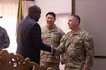U.S. Army Col. Patrick J. Szvetitz, North Carolina National Guard Joint Force Headquarters director of strategic plans and policy, right, shakes hands with Maambo Haamaundu, Zambia Ministry of Defence permanent secretary, left, at the Zambia Army Headquarters, Lusaka, Zambia, June 8, 2026. Hosted by the Zambian Defence Force, the workshop served as the Department of War National Guard Bureau State Partnership Program for the North Carolina National Guard's first multinational event held outside the U.S., enabling partner nations to exchange lessons learned from past disasters and share best practices in disaster preparedness, mitigation and emergency management. Photo by Senior Airman Zeno Kang.