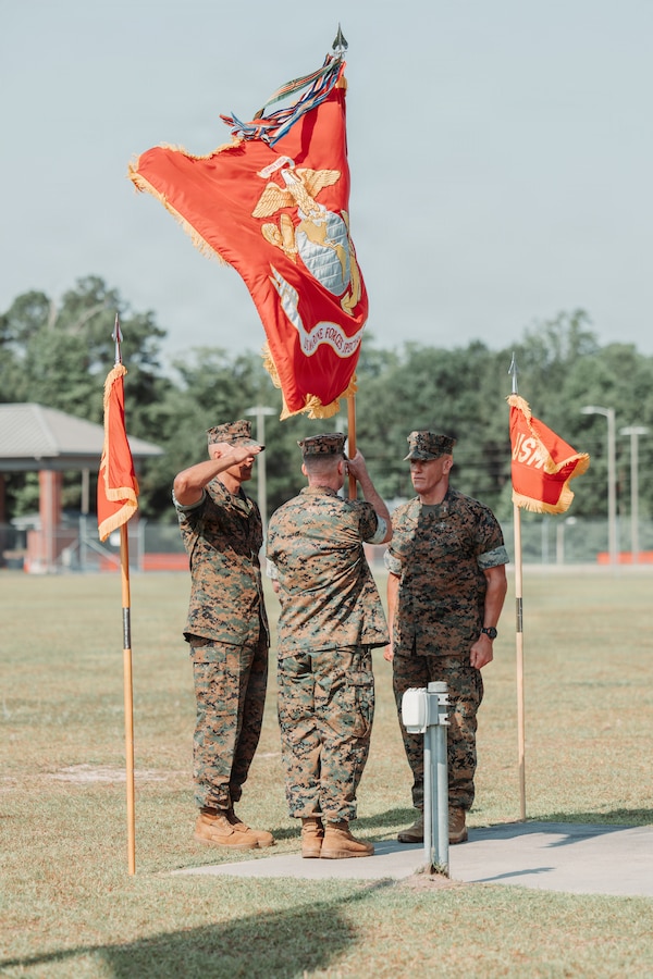 U.S. Marine Corps Maj. Gen. Michael A. Brooks, left, commander, Marine Forces Special Operations Command, receives the MARSOC colors from Maj. Gen. Peter D. Huntley right, during the change of command ceremony on Marine Corps Base Camp Lejeune, North Carolina, June 12, 2026. During the ceremony, Maj. Gen. Peter D. Huntley relinquished command of MARSOC to Maj. Gen. Michael A. Brooks, a tradition symbolizing the transfer of authority, responsibility and accountability of the Marines and Sailors under his charge. (U.S. Marine Corps photo by Lance Cpl. Jared Saul)