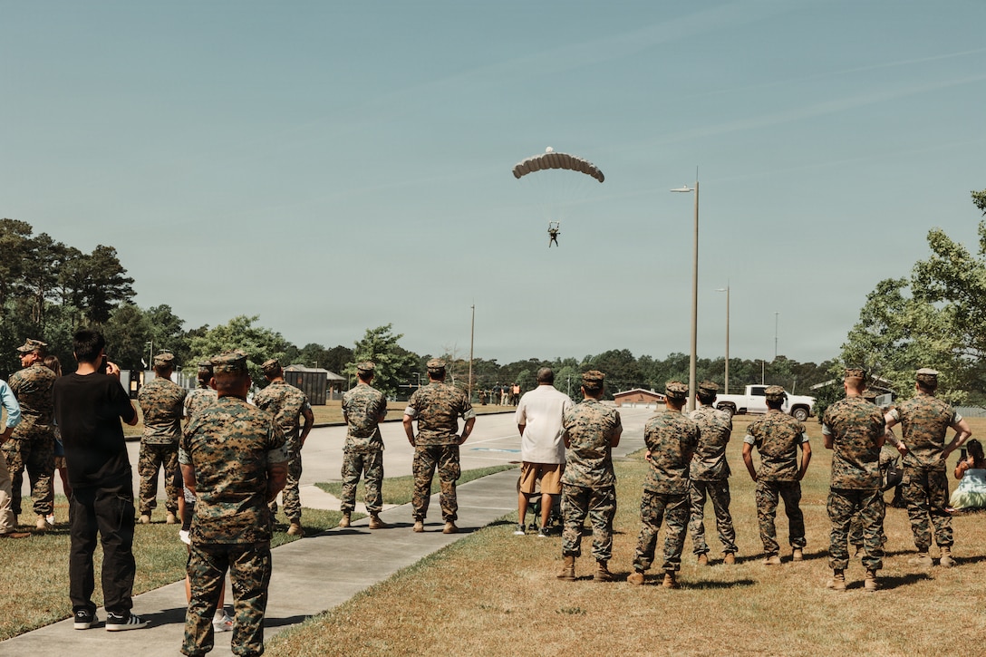 U.S. Marines, Sailors and civilians with Marine Forces Special Operations observe the capabilities exercise held in honor of MARSOC’s heritage week celebration, at Marine Corps Base Camp Lejeune, North Carolina, April 24, 2026. MARSOC celebrates 20 years since its activation, which began after Secretary of Defense Donald Rumsfeld directed the establishment of a Marine Corps component within U.S. Special Operations Command on February 24, 2006. (U.S. Marine Corps photo by Staff Sgt. Andrew Skiver)