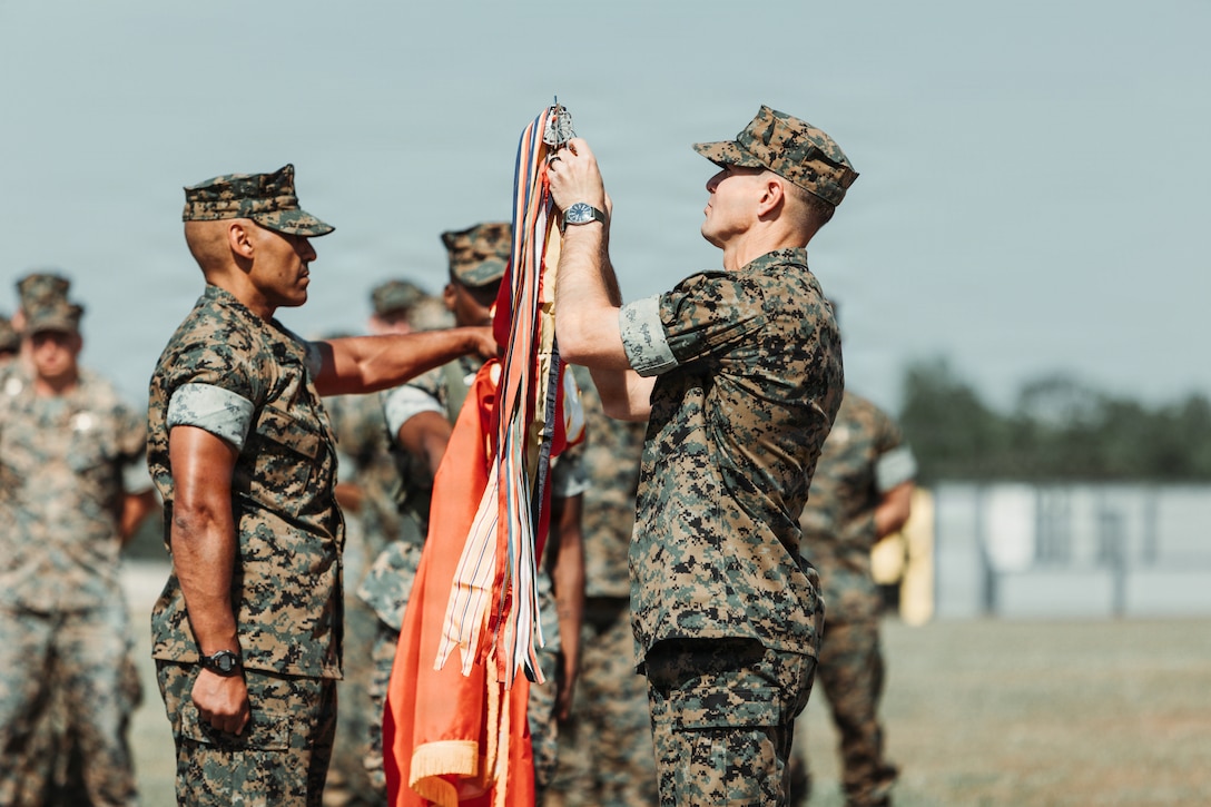 U.S. Marines Assigned to Marine Forces Special Operations Command execute a battle colors rededication ceremony held in honor of MARSOC’s heritage week celebration, at Marine Corps Base Camp Lejeune, North Carolina, April 24, 2026. MARSOC celebrates 20 years since its activation, which began after Secretary of Defense Donald Rumsfeld directed the establishment of a Marine Corps component within U.S. Special Operations Command on February 24, 2006. (U.S. Marine Corps Photo by Staff Sgt. Andrew Skiver)