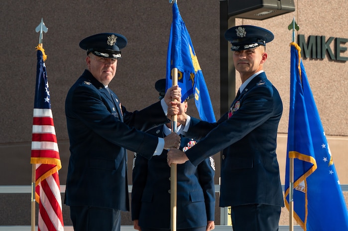 Col. Eric Phillips and Col. Jason Glynn pose for a photo.