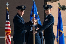 Col. Jason Glynn and Col. Mary Carnduff pose for a photo.