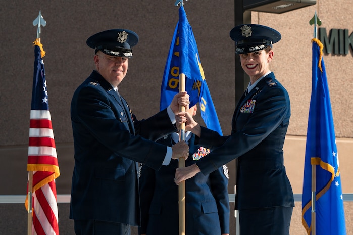 Col. Jason Glynn and Col. Mary Carnduff pose for a photo.