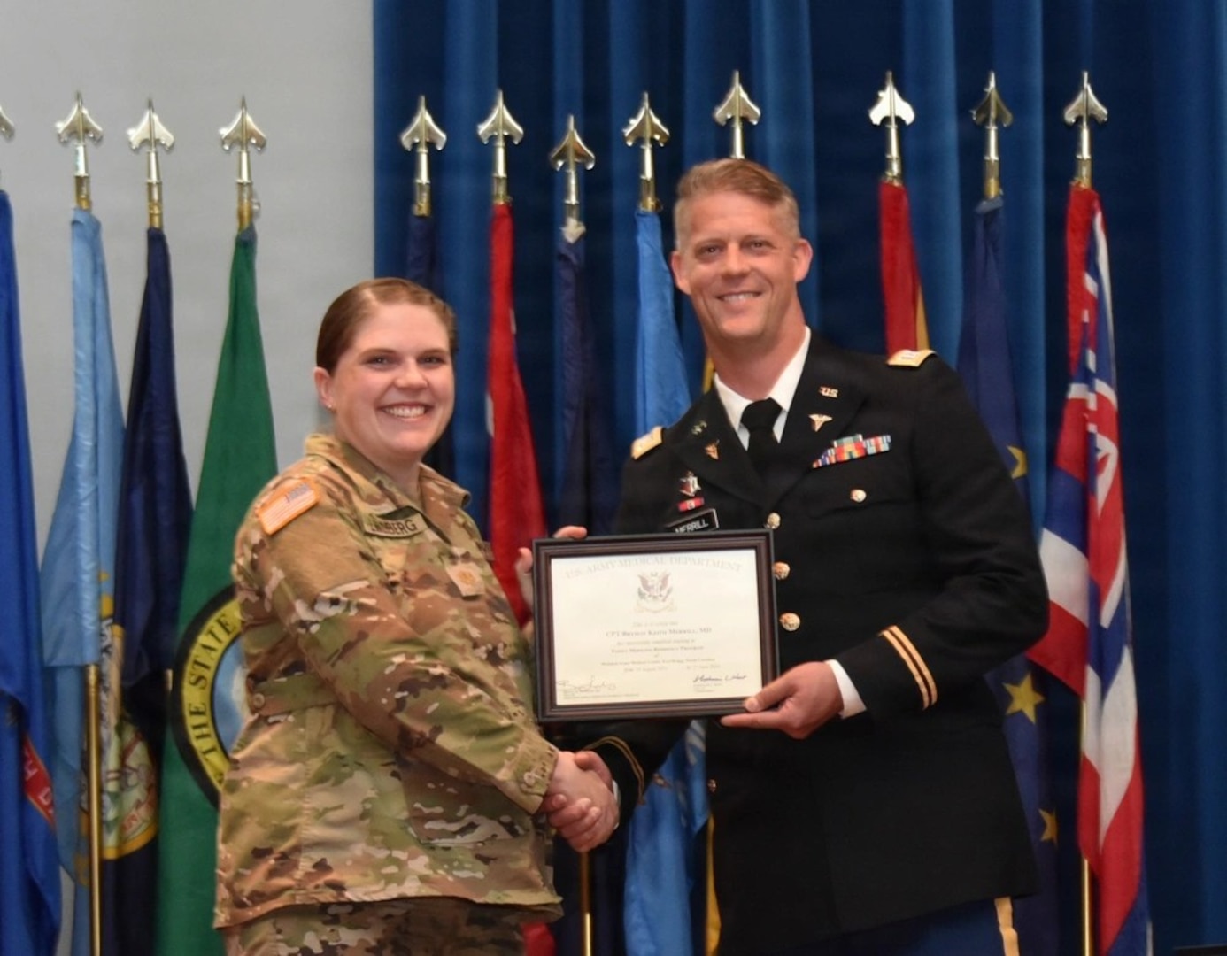 Graduates, family members, and leadership gather during the Womack Army Medical Center Graduate Medical and Graduate Dental Education commencement ceremony at Fort Bragg, N.C., June 5, 2026. The annual event honored a new class of Army physicians, dentists, nurses, and social workers who completed training in nationally accredited programs, preparing them to support military medicine missions worldwide.