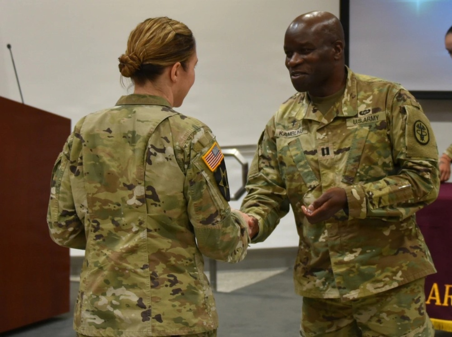 Womack Army Medical Center kicks off Nurses Week with opening ceremony to include the “Blessing of the Hand’s”, a time-honored tradition. U.S. Army Chaplain Ronald Kambuku blesses the hand of a nurse, May 4, 2026, Fort Bragg, North Carolina (Photo by Keisha Frith, Womack Army Medical Center Public Affairs Office)