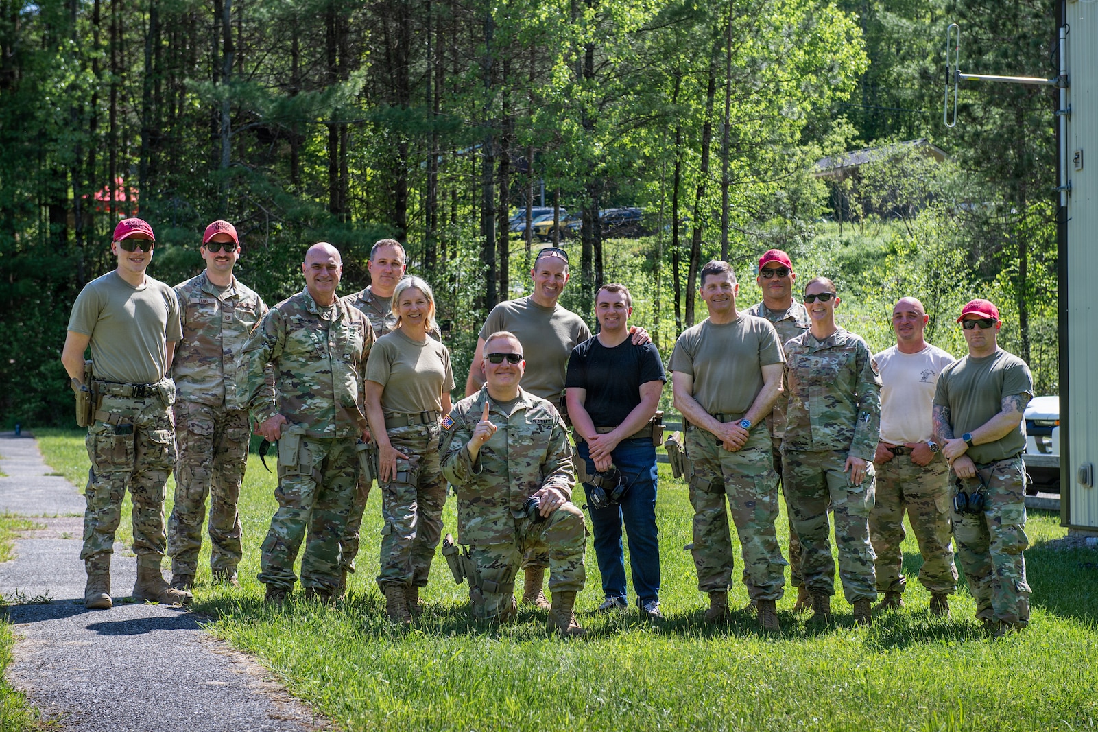 Photo of a group of senior leaders from the Vermont Army and Air National Guard, and a West Point cadet, posing for a group photo with combat arms instructors from both the Vermont Army and Air National Guard at the Ethan Allen Firing Range in Jericho, Vermont.