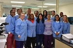 Some members of the Womack Army Medical Center Department of Pathology team pose for a group photo. From analyzing routine blood work to standing by in the operating room, these unseen professionals are responsible for the data that guides critical medical decisions, April 23, 2026, Fort Bragg NC. (Photo by Keisha Frith, Womack Army Medical Center Public Affairs Office