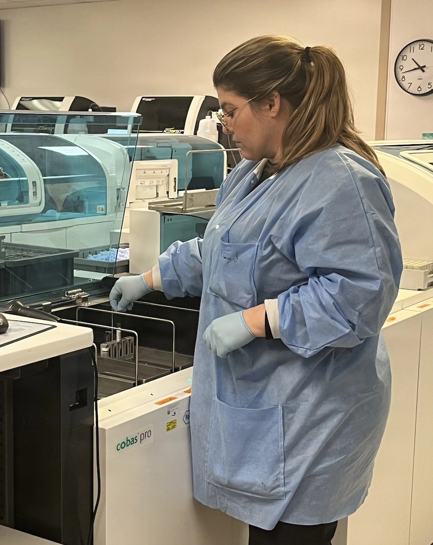 Womack Army Medical Center pathology technician Jeannette Velez loading samples for chemistry testing, April 23, 2026, Fort Bragg North Carolina. (Photo by Keisha Frith, Womack Army Medical Center Public Affairs Office)