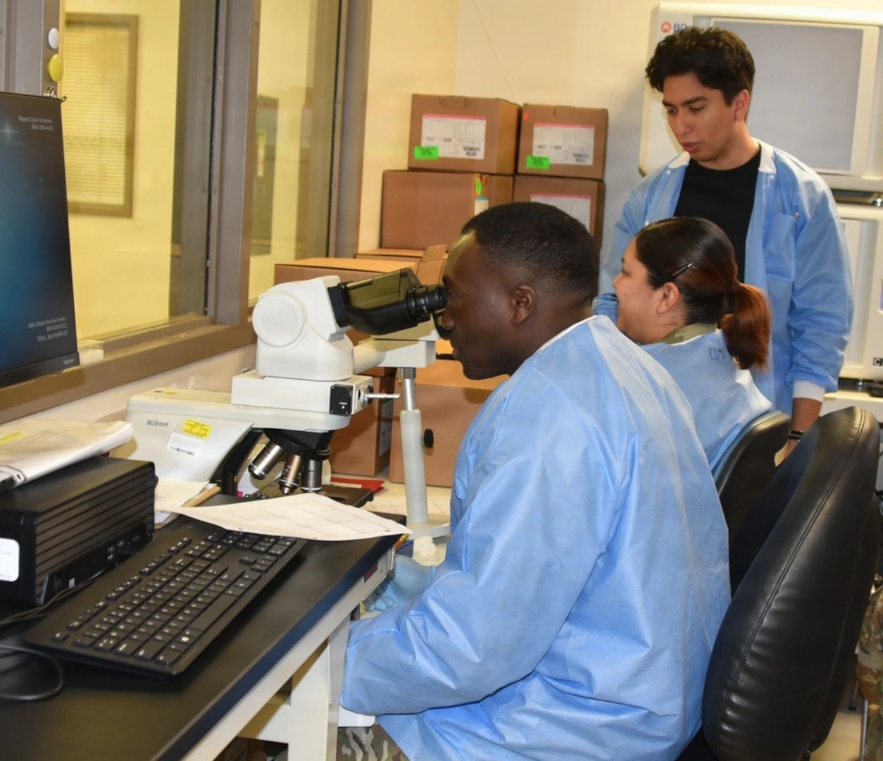 Womack Army Medical Center, Pathology technician review gram stains to identify the type of bacteria causing an infection. April 23, 2026, Fort Bragg North Carolina. (Photo by Keisha Frith, Womack Army Medical Center Public Affairs Office)