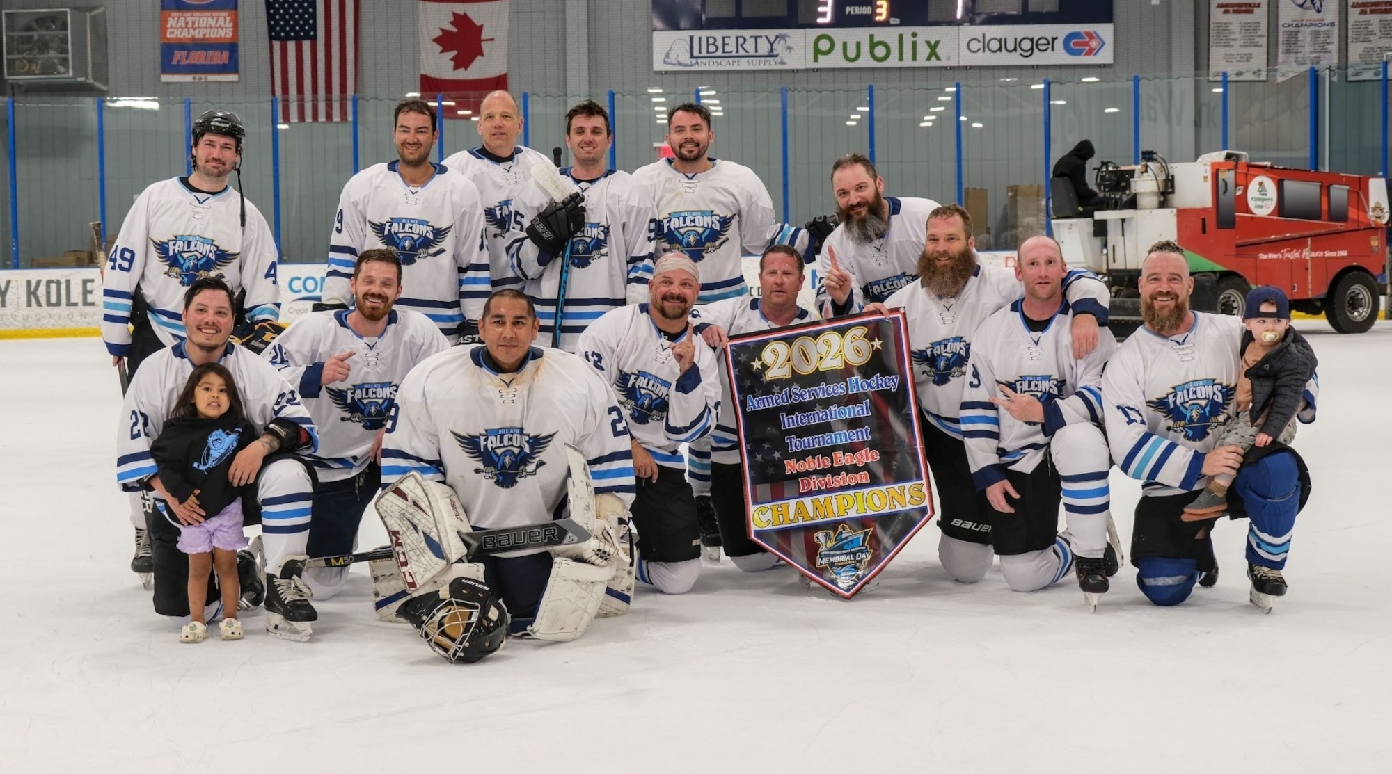Players from the Hill hockey program pose with their first-place banner at the Armed Services Hockey Tournament in Jacksonville, Fla., May 25, 2026.