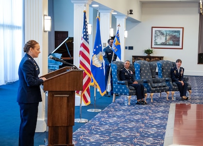 Incoming 11th Wing Logistics Readiness Squadron commander gives speech.