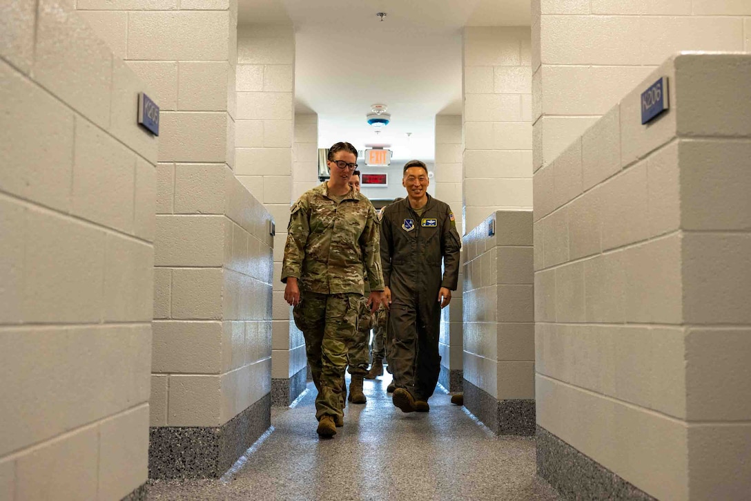 Service member is recognized for her work with military working dog facility.