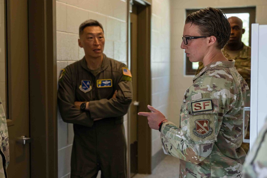 Service member is recognized for her work with military working dog facility.