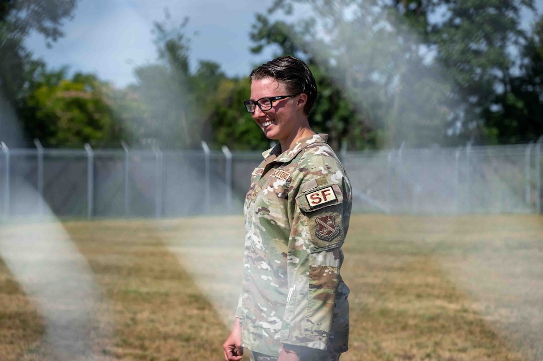 Service member is recognized for her work with military working dog facility.