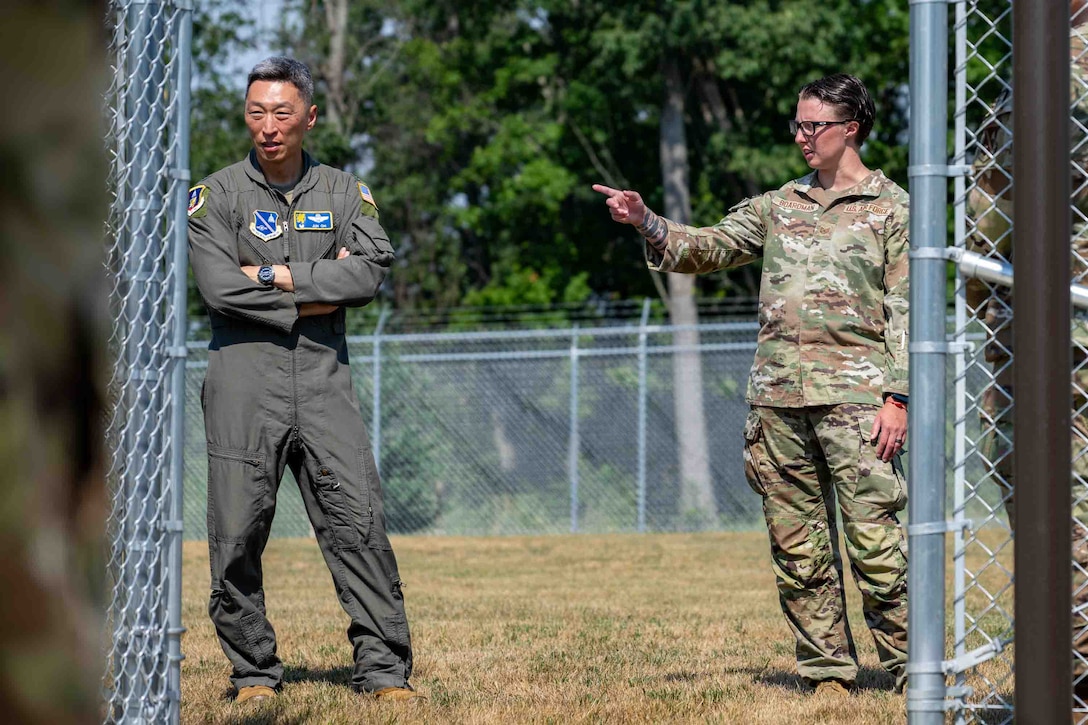 Service member is recognized for her work with military working dog facility.