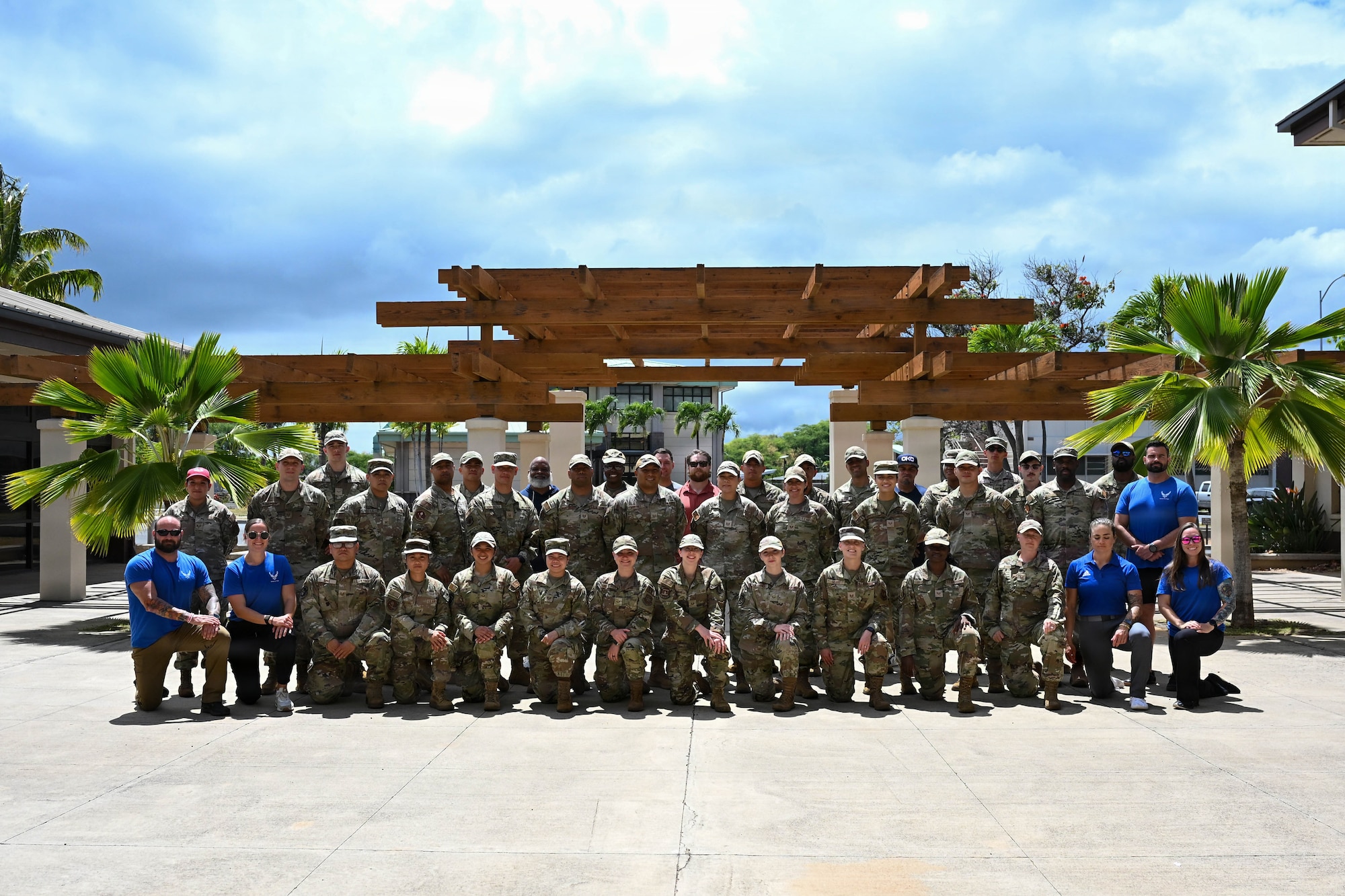 Airmen and instructors pose for a group photo during a Master Fitness Leader course at Joint Base Pearl Harbor-Hickam, June 11, 2026. Graduates return to their units equipped to advise commanders, educate fitness leaders and promote a culture of physical readiness. (U.S. Air Force photo by Senior Airman Lauren Torres)