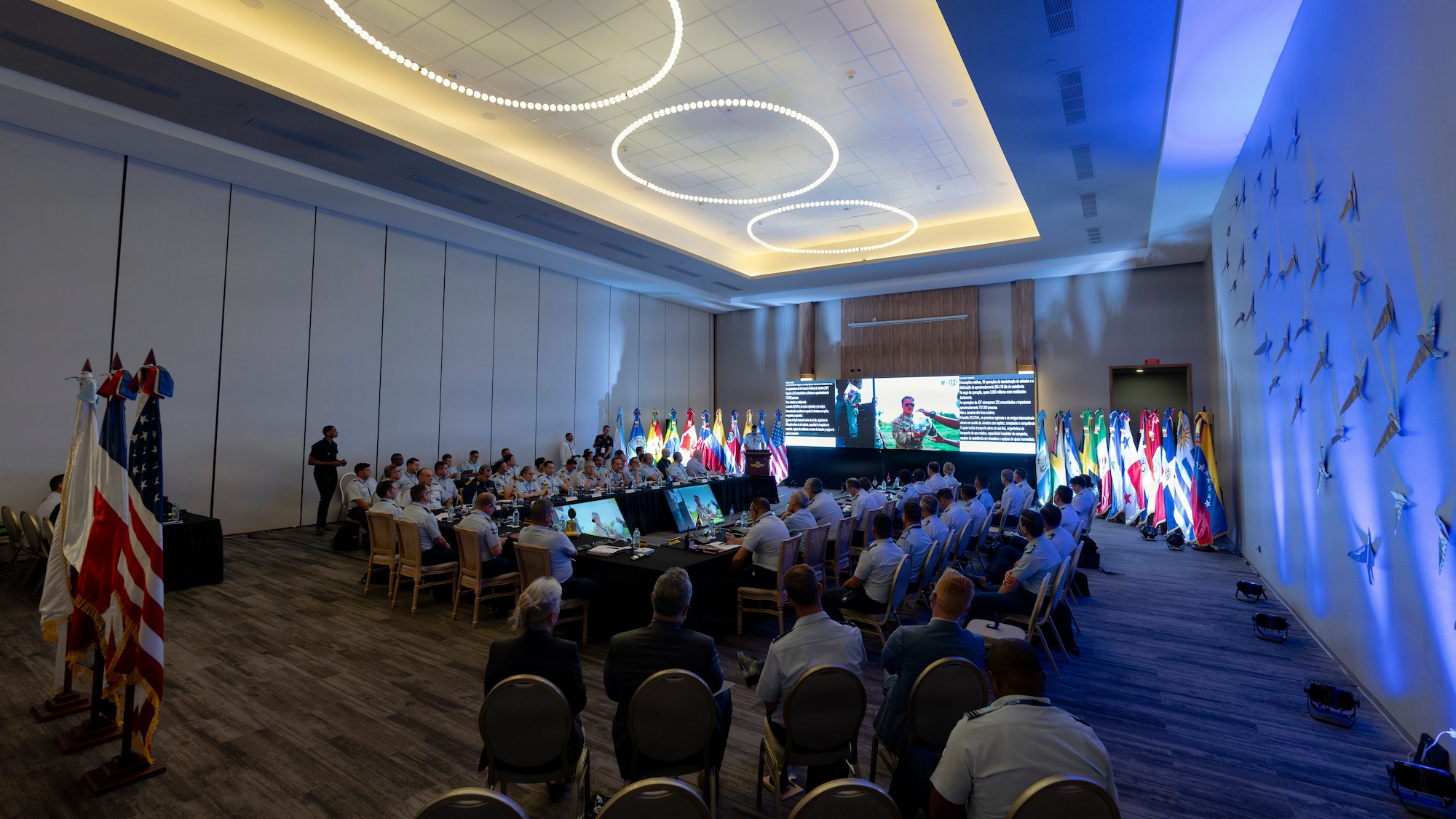 Air Force leaders and representatives from across the Western Hemisphere receive a briefing on Hurricane Melissa from a Jamaican Defense Force delegate during the 66th annual Conference of the American Air Chiefs (CONJEFAMER) in Punta Cana, Dominican Republic, June 16, 2026. The briefing highlighted lessons learned from Hurricane Melissa and supported discussions on multinational coordination during humanitarian assistance and disaster relief operations. (U.S. Air Force photo by Tech. Sgt. Rachel Maxwell)