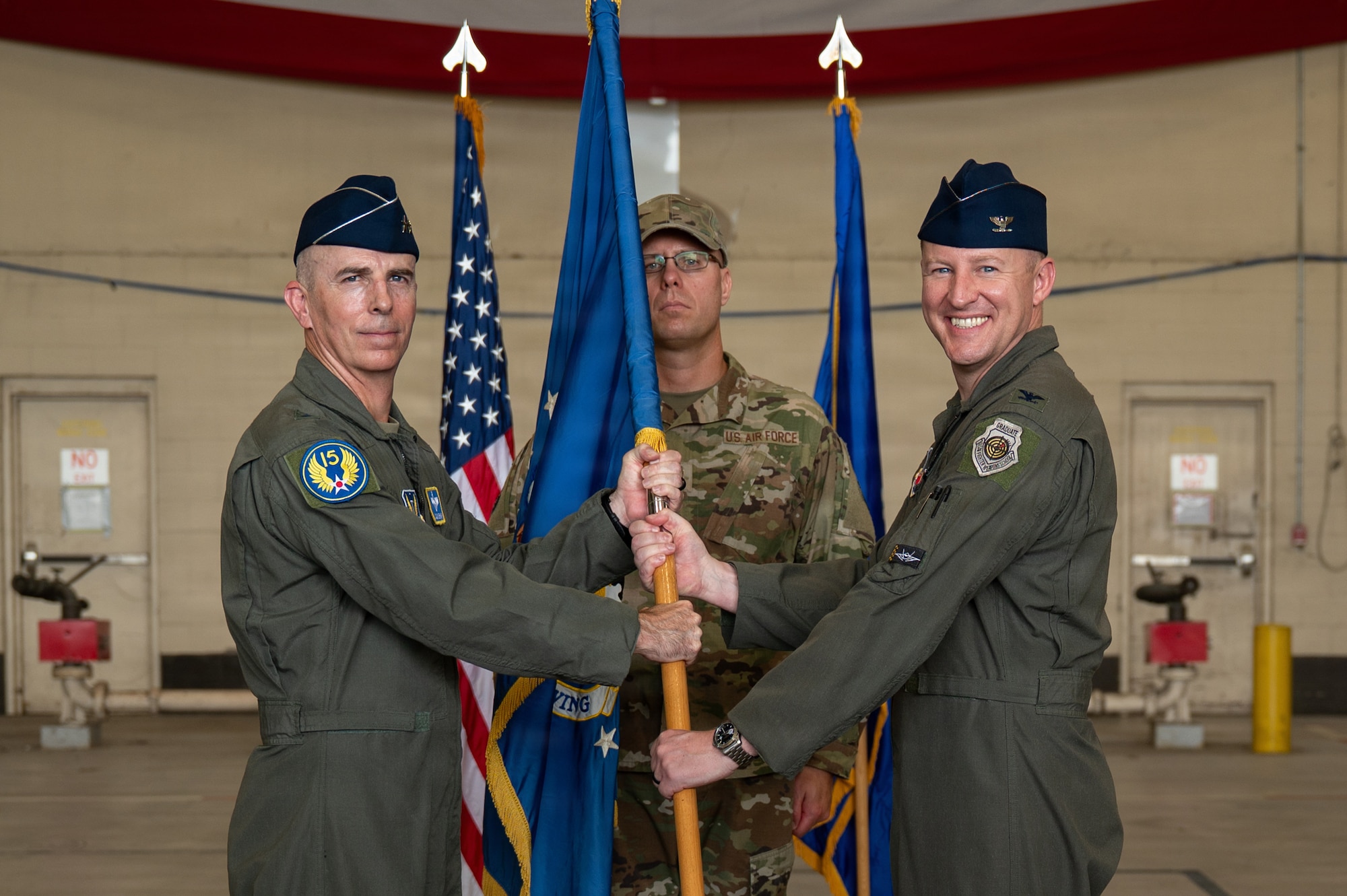 U.S. Air Force Col. Ryan Thulin, right, receives the 325th Fighter Wing guidon from Maj. Gen. Steven Behmer, Fifteenth Air Force commander, during a change of command ceremony at Tyndall Air Force Base, Florida, June 23, 2026. Thulin assumed command of the 325th FW after serving as the 33rd Operations Group commander for the past two years.
