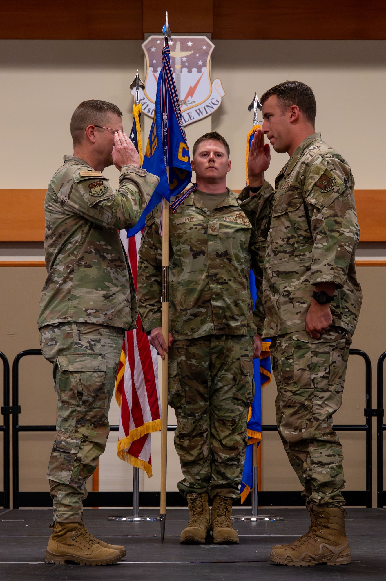 U.S. Air Force Maj. Aaron Quick, incoming commander of the 341st Contracting Squadron, right, salutes Col. Brian Low, 341st Mission Support Group commander, during a change of command at Malmstrom Air Force Base, Montana, June 23, 2026.