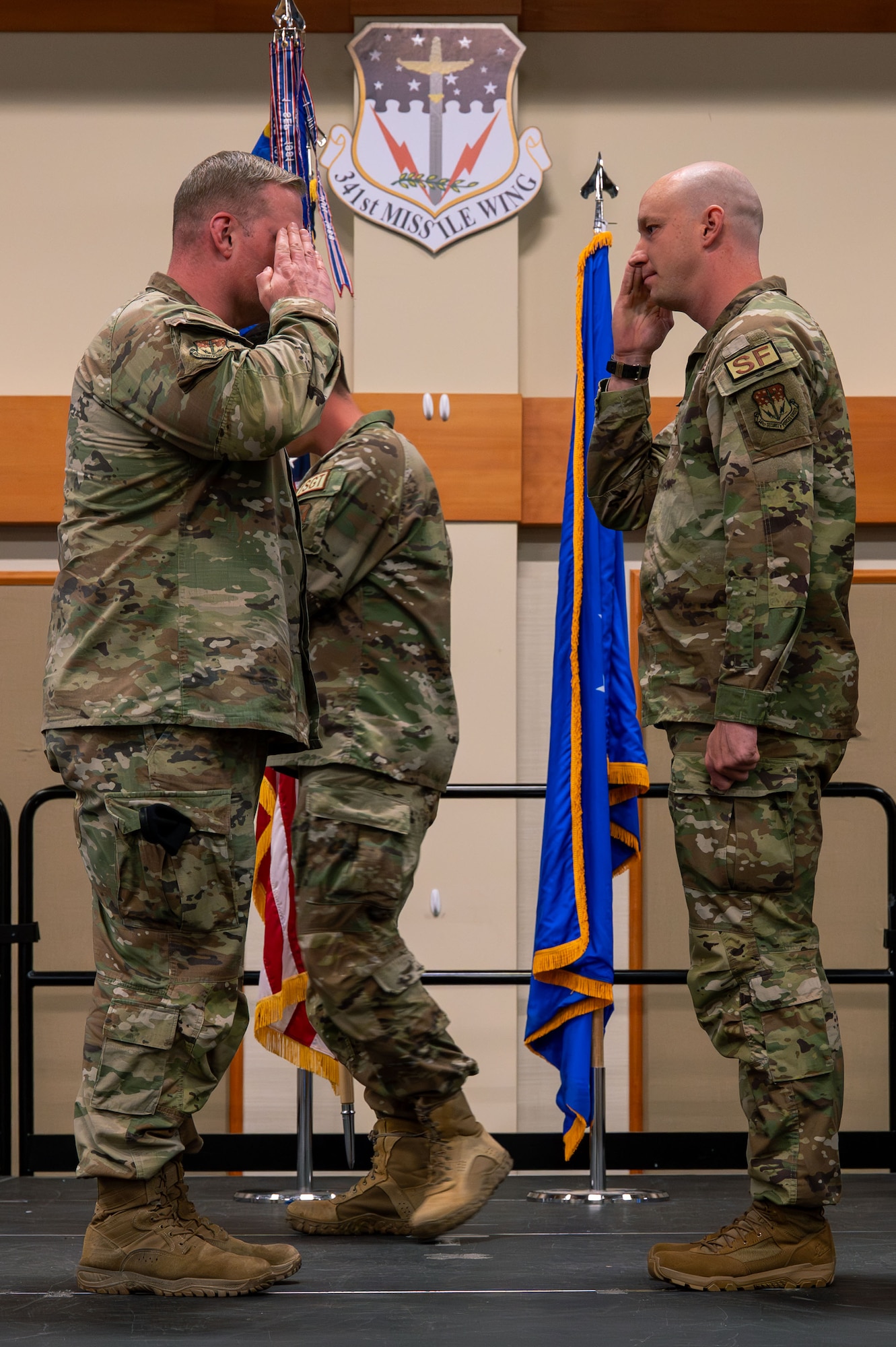 U.S. Air Force Maj. Ian A. Latham, incoming commander of the 341st Missile Security Forces Squadron, right, salutes Col. Drew Gehler, 341st Security Forces Group commander, during a change of command at Malmstrom Air Force Base, Montana, June 23, 2026.