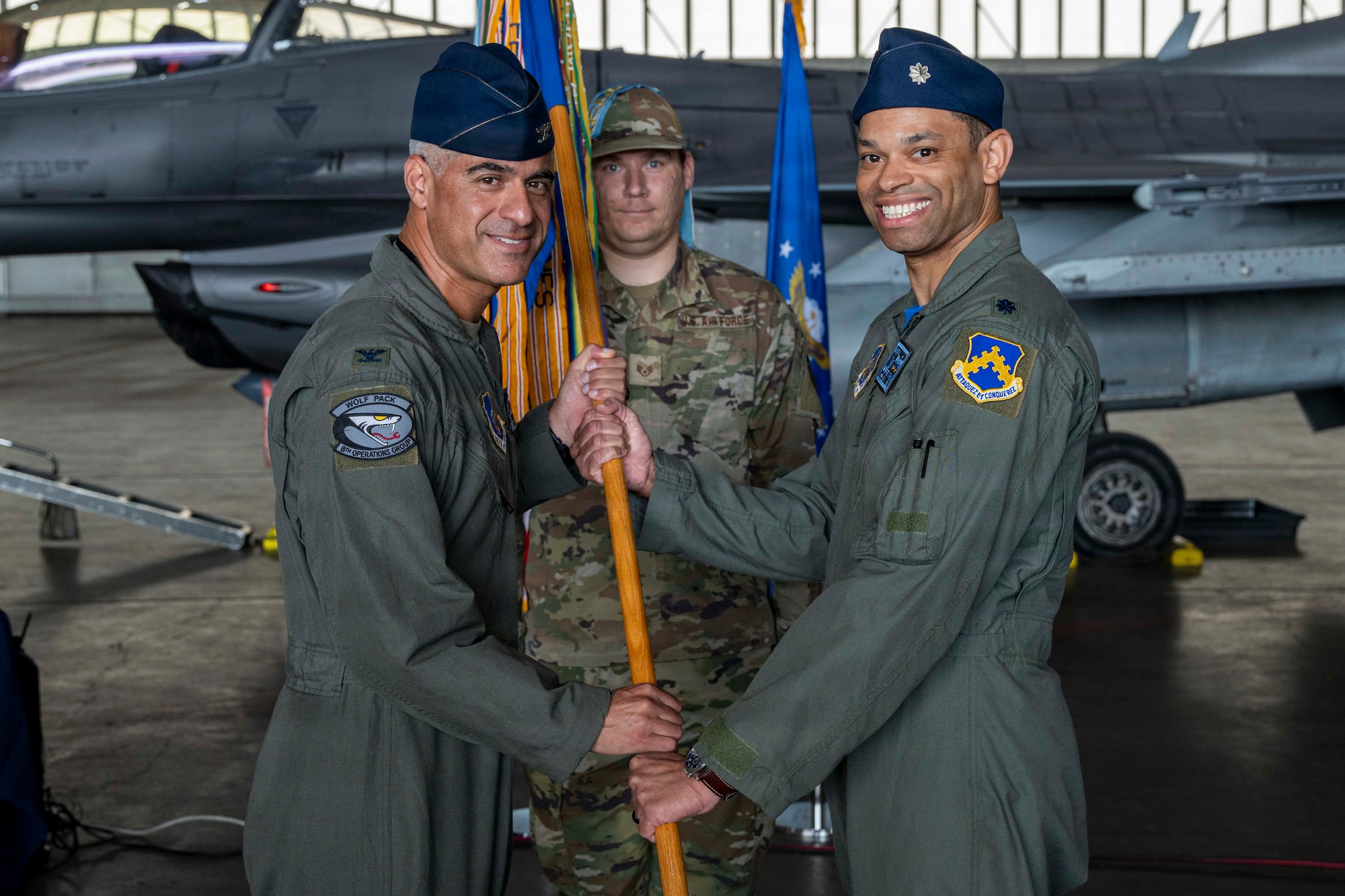 U.S. Air Force Lt. Col. Mark Marshall, right, assumes command of the 35th Fighter Squadron from U.S. Air Force Col. Ruben Amezaga, 8th Operations Group commander, during a change of command ceremony at Eielson Air Force Base, Alaska, June 12, 2026. The 35th FS projects “Fight Tonight” combat airpower to deter adversaries, helping to secure the Korean Peninsula and provide stability across the Indo-Pacific. (U.S. Air Force photo by Senior Airman Nicholas Paczkowski)