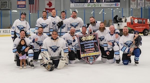 Players from the Hill hockey program pose with their first-place banner at the Armed Services Hockey Tournament in Jacksonville, Fla., May 25, 2026.