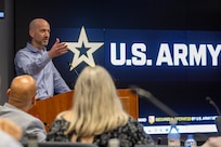 Aaron Parker, Officer of the Assistant Secretary of the Army for Financial Management and Comptroller senior financial management contractor, discusses dashboards during a military pay operations forum at the Maj. Gen. Emmett J. Bean Federal Center in Indianapolis June 23, 2026. During the 3-day forum, Army military pay office directors from around the world gathered together with subject matter experts and leaders from the U.S. Army Financial Management Command, the Defense Finance and Accounting Service, and other Army organizations. (U.S. Army photo by Mark R. W. Orders-Woempner)