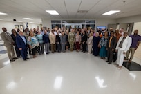 U.S. Army Financial Management Command Army military pay office directors and leaders pose for a photo during a military pay operations forum at the Maj. Gen. Emmett J. Bean Federal Center in Indianapolis June 23, 2026. During the 3-day forum, Army military pay office directors from around the world gathered together with subject matter experts and leaders from USAFMCOM, the Defense Finance and Accounting Service, and other Army organizations. (U.S. Army photo illustration by Mark R. W. Orders-Woempner)