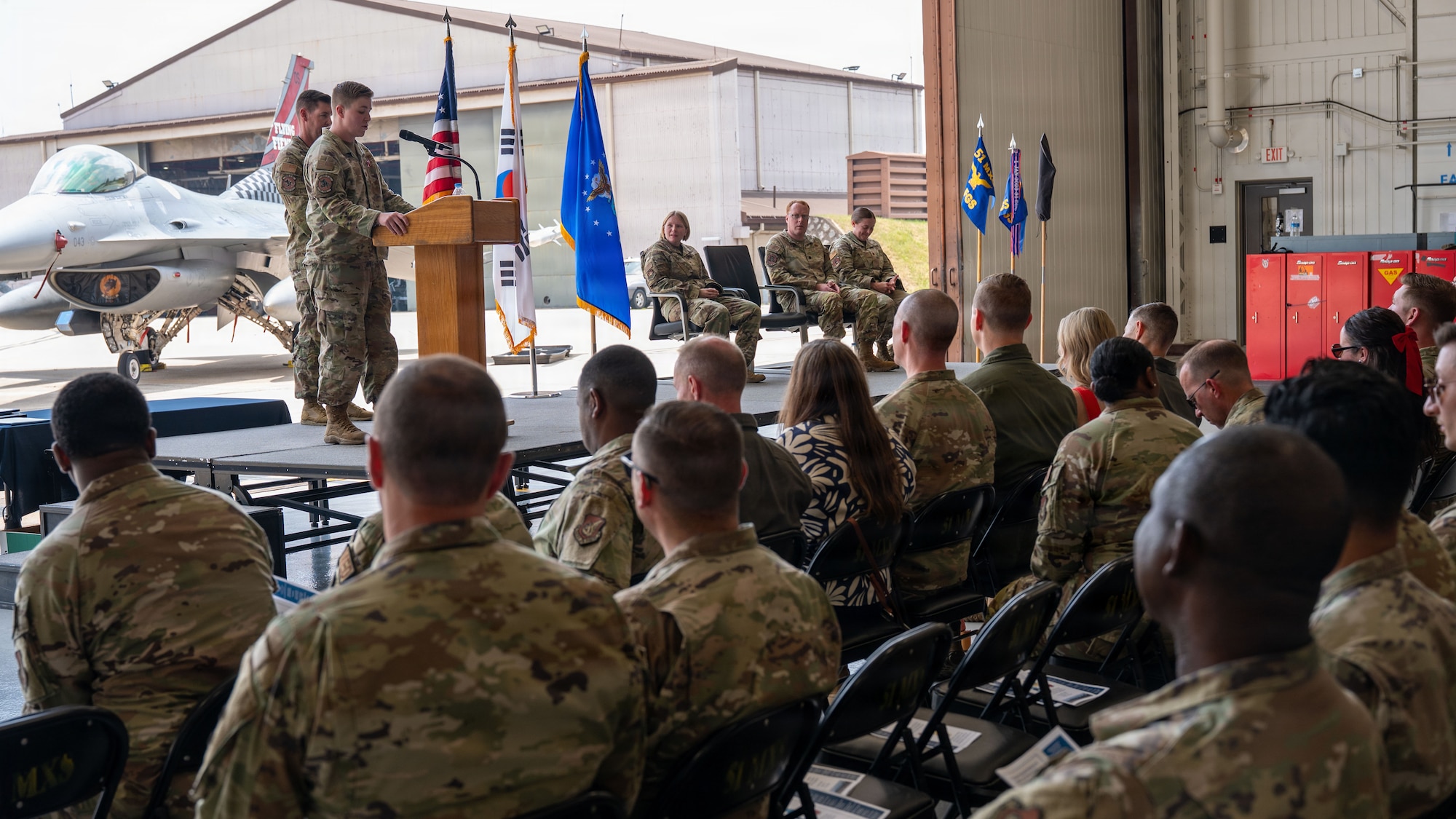 Airmen participate in a change of command ceremony at Osan.