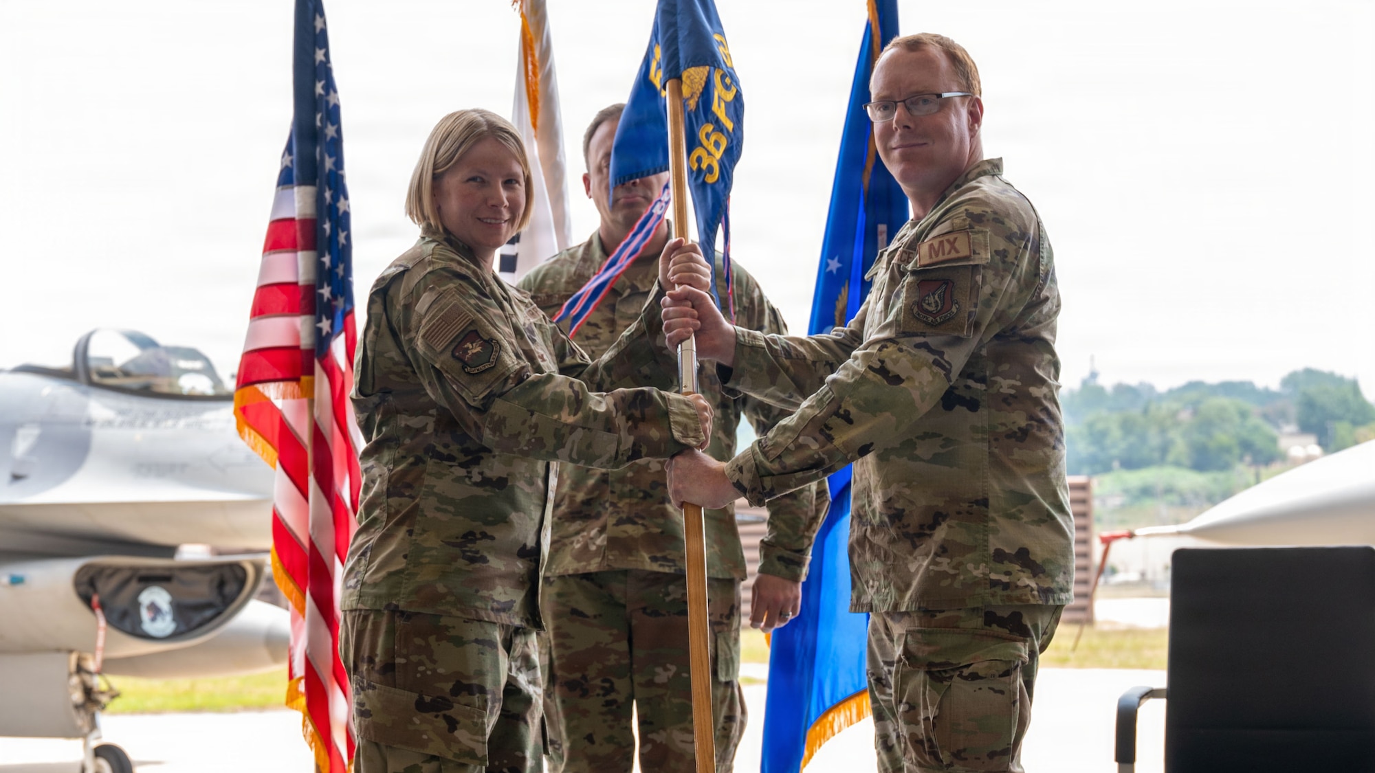 Airmen participate in a change of command ceremony at Osan.