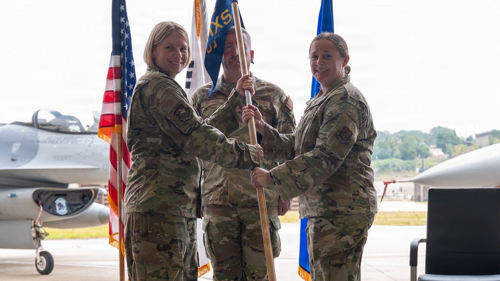 Airmen participate in a change of command ceremony at Osan.