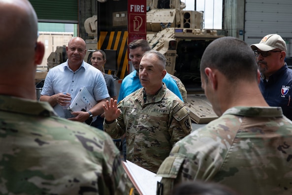 U.S. Army Maj. Gen. Michael B. Lalor, commanding general of the 21st Theater Sustainment Command, speaks with Soldiers and civilians during a visit to Maintenance Activity Kaiserslautern at Kaiserslautern Army Depot, Kaiserslautern, Germany, June 17, 2026. The visit provided an opportunity to discuss sustainment readiness, equipment maintenance operations and support to Army forces across Europe. (U.S. Army photo by Pfc. Kaiden Silversmith)