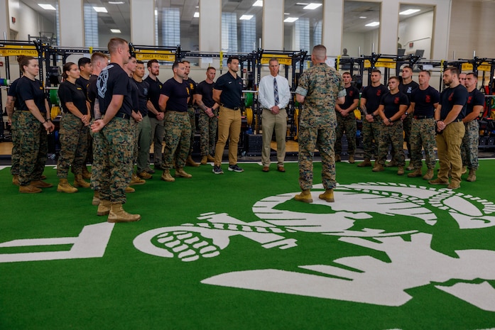 U.S. Marine Corps Col. Robert McCarthy III, the commanding officer of The Basic School, addresses marines at Ramer Hall on Marine Corps Base Quantico, Virginia, June 16, 2026. The facility upgrades to Ramer Hall strengthens the vital partnerships between TBS, other units, and programs such as the Basic Officer Course and MAFCE. The Ramer Hall facility upgrades strengthen the vital partnerships between TBS, Basic Officer Course, MAFCE and other units. This collaboration establishes a sustainable foundation for optimizing human performance and resiliency across the entire Marine Corps. (U.S. Marine Corps photo by Lance Cpl. Lynsee Avila-Ramirez)