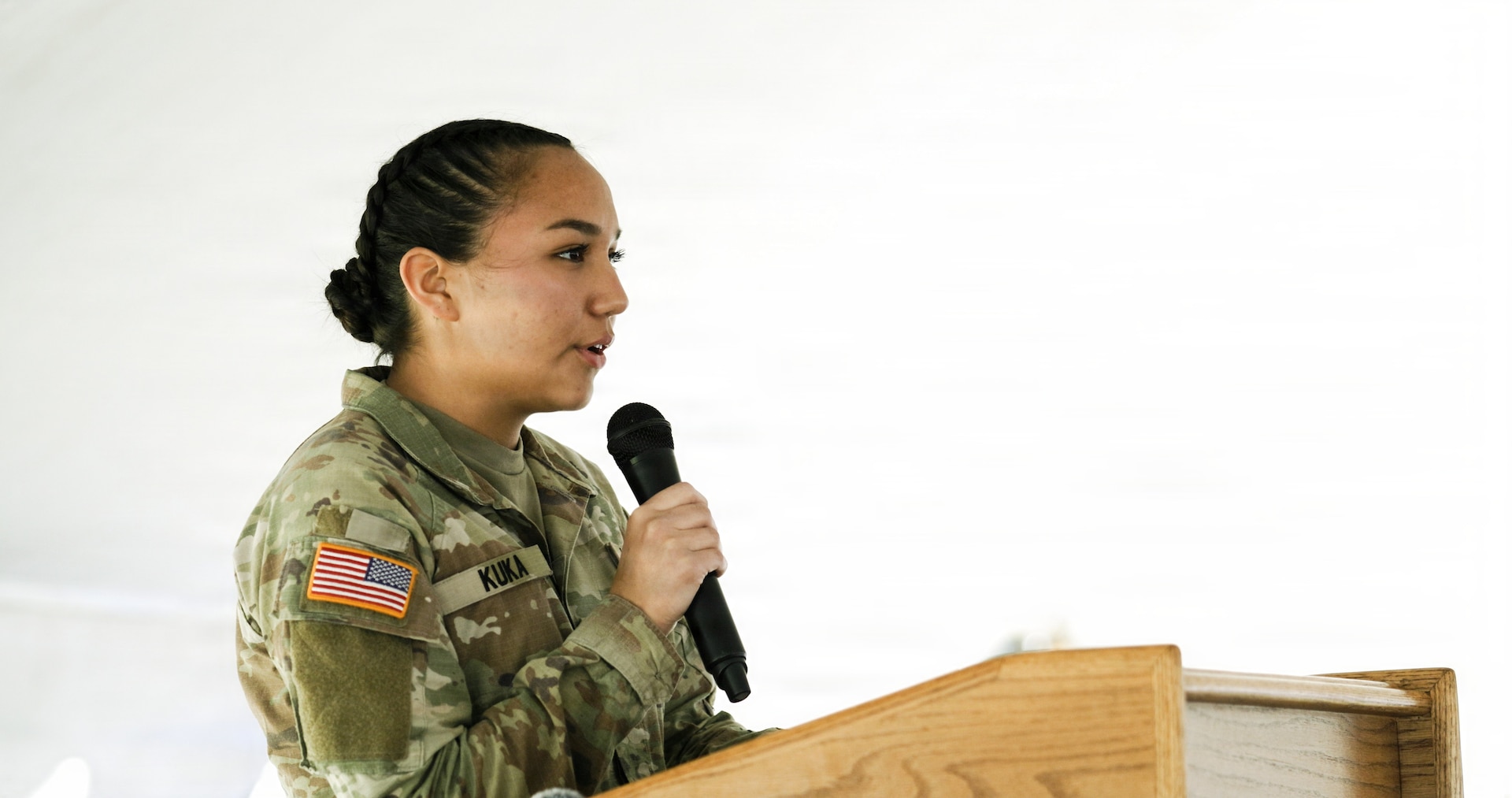 Pfc. Kingsley Kuka relaxes in traditional regalia following her historic remarks at the 150th-anniversary commemoration of the Battle of the Rosebud on June 17 at Rosebud Battlefield State Park, Montana. The anniversary included a wreath-laying ceremony which served as a centerpiece of the event, bringing together representatives from multiple tribal nations, members of the Kobold family, Kuka, and Myron Red Sleeves who both represented the Northern Cheyenne Tribe and the U.S. Army.