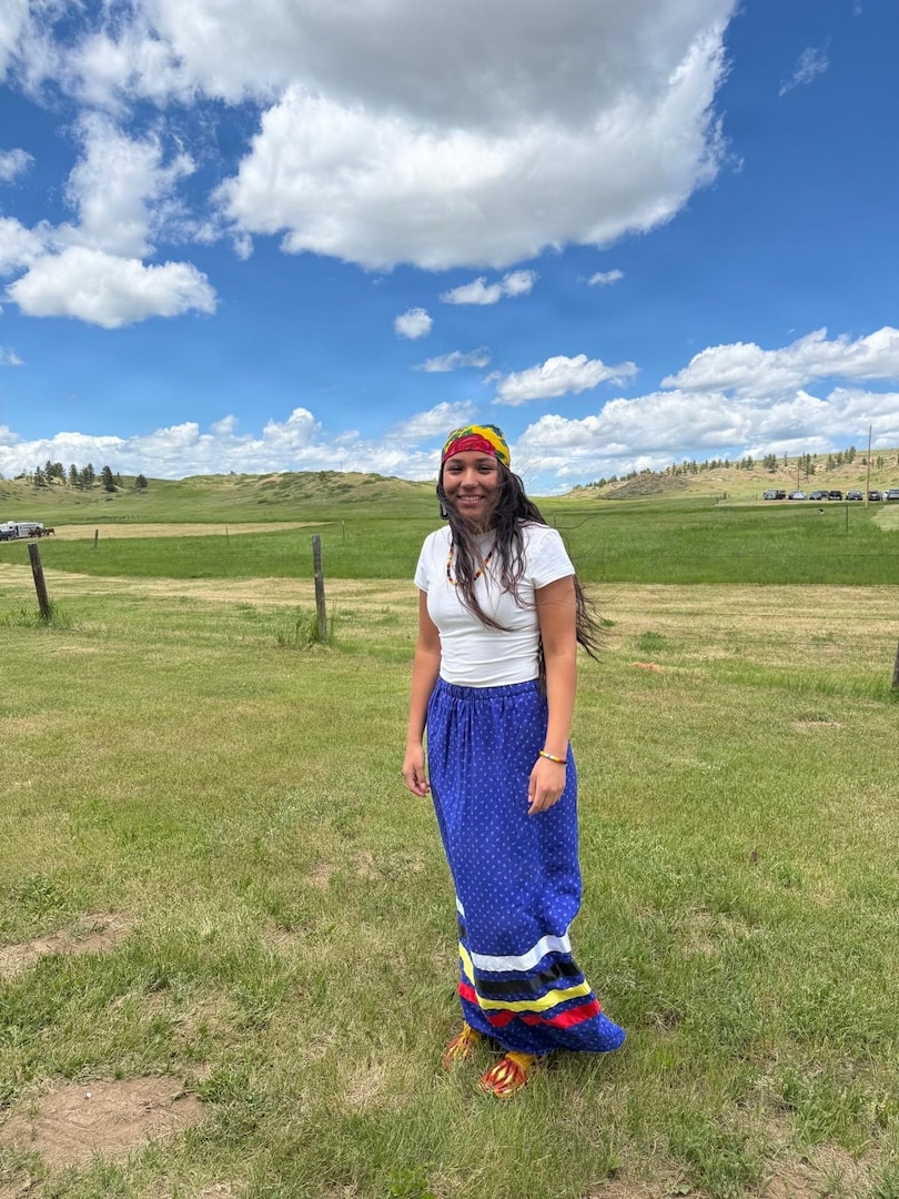 Pfc. Kingsley Kuka relaxes in traditional regalia following her historic remarks at the 150th-anniversary commemoration of the Battle of the Rosebud on June 17 at Rosebud Battlefield State Park, Montana. The anniversary included a wreath-laying ceremony which served as a centerpiece of the event, bringing together representatives from multiple tribal nations, members of the Kobold family, Kuka, and Myron Red Sleeves who both represented the Northern Cheyenne Tribe and the U.S. Army.