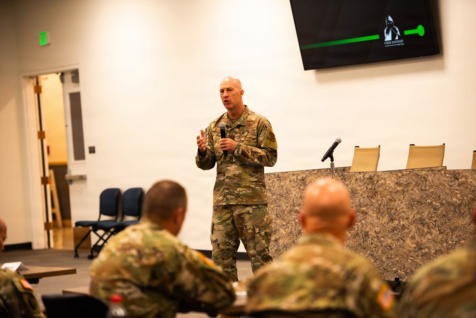 Maj. Gen. Timothy J. Donnellan, adjutant general of the Idaho National Guard and commanding general of the Idaho National Guard, addresses the audience during distinguished visitor day, the final day of Cyber Discovery 2026, at the state of Idaho Office of Information Technology Services, Chinden Campus, Boise, June 9, 2026.