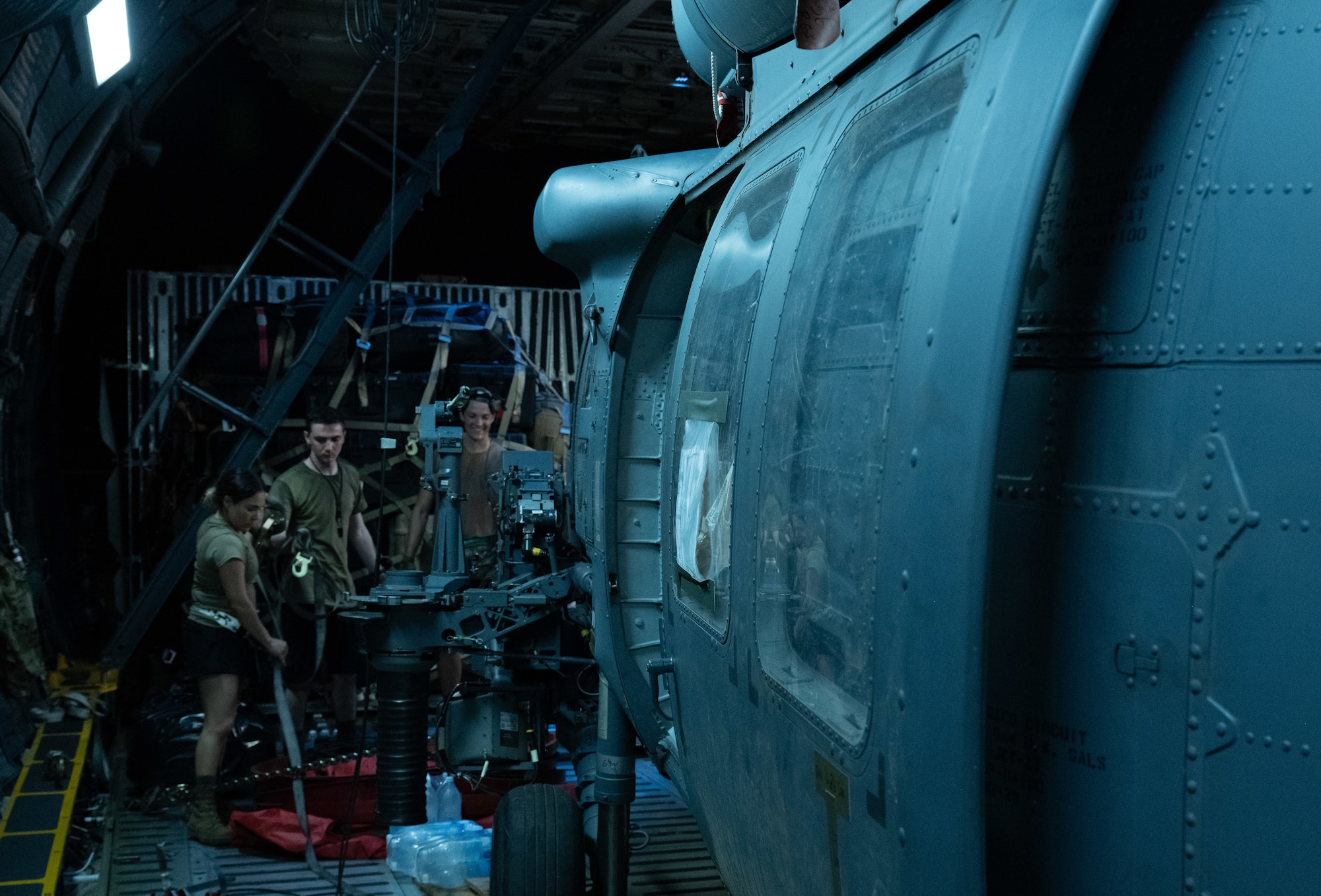 Helicopters being offloaded from a C-5 Galaxy