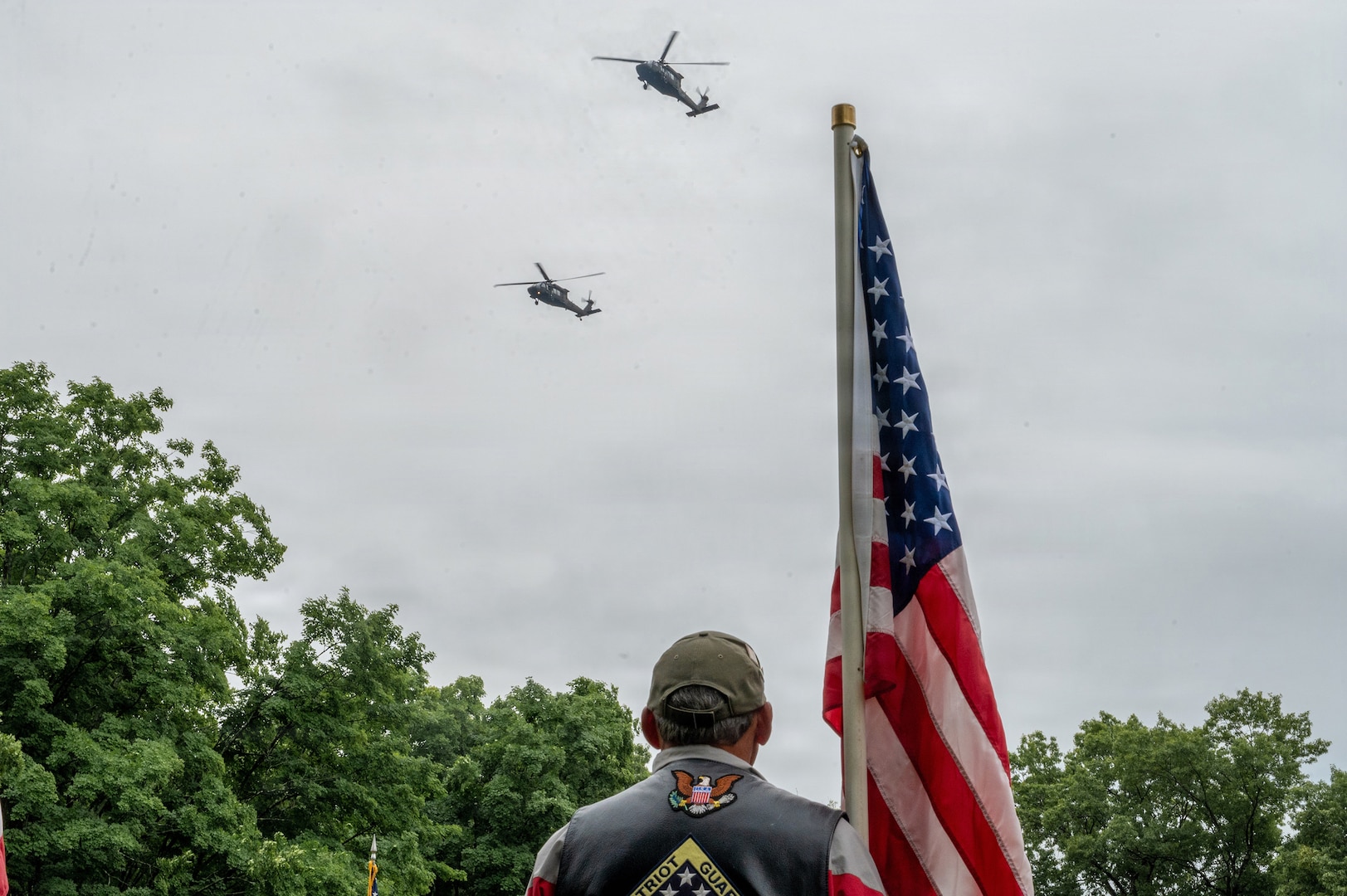 Two Connecticut Army National Guard UH-60 Black Hawk helicopters conduct a flyover of the funeral for U.S. Army Air Forces Tech. Sgt. Donald A. Dorman at Oak Hill Cemetery, Southington, Connecticut, June 23, 2026.