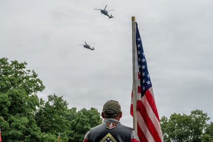 Two Connecticut Army National Guard UH-60 Black Hawk helicopters conduct a flyover of the funeral for U.S. Army Air Forces Tech. Sgt. Donald A. Dorman at Oak Hill Cemetery, Southington, Connecticut, June 23, 2026.